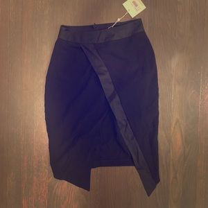 Asymmetrical black satin panel skirt. Size M.